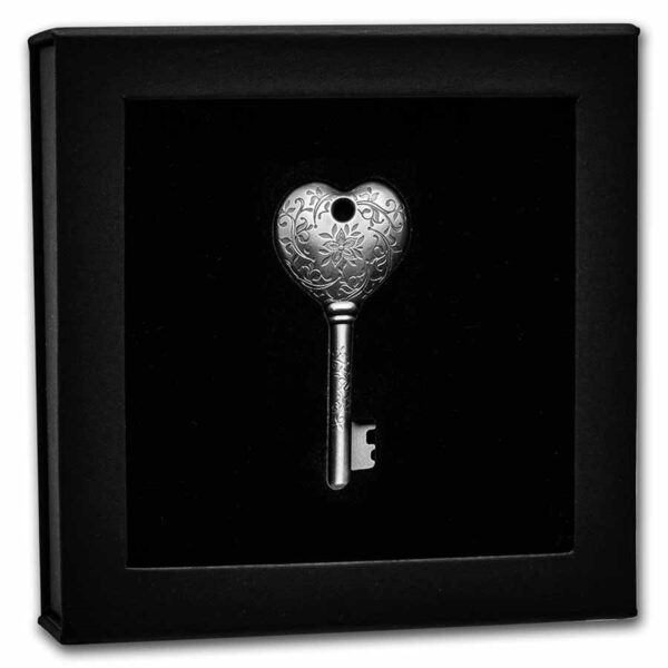 Packaging interior llave de plata pura en forma de corazón