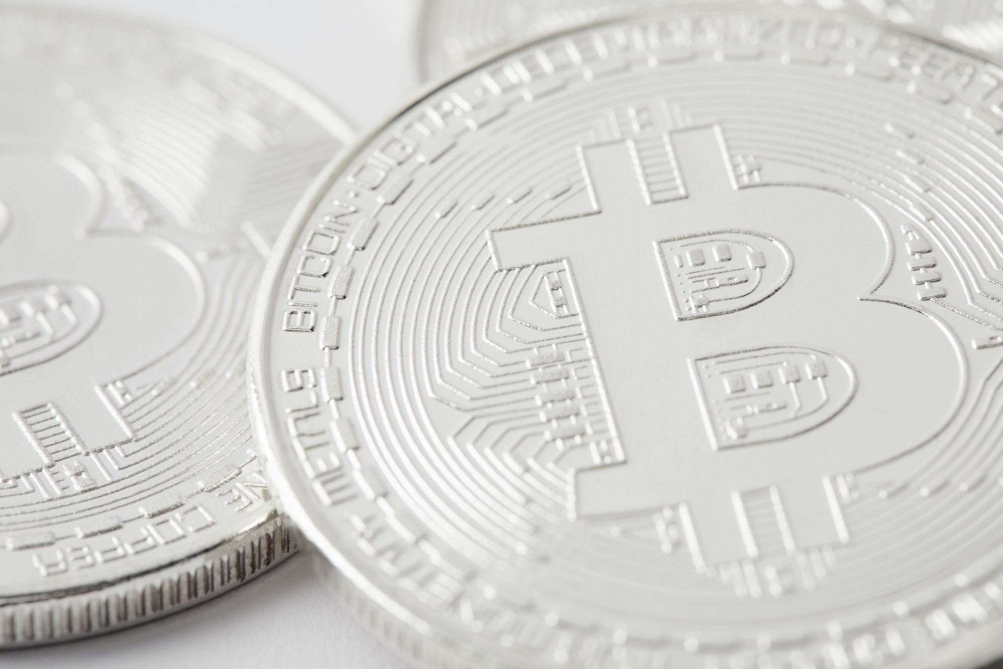 close-up shot of pile silver bitcoins