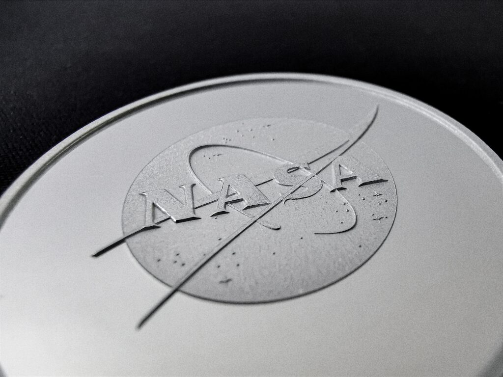 Moneda de plata 999 con isologotipo NASA