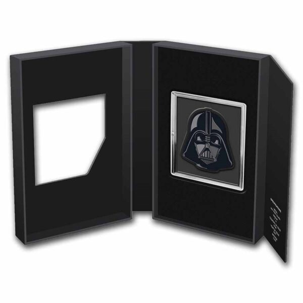 Packaging oficial abierto de la moneda de plata Darth Vader.
