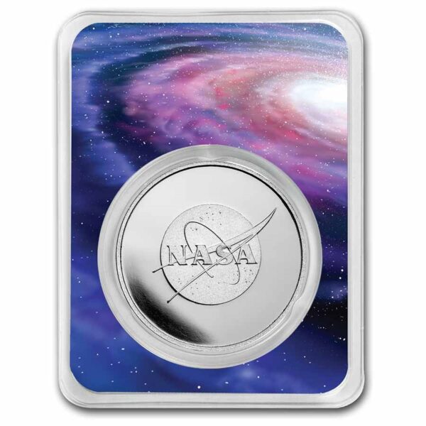 Empaque protector de la moneda NASA MEATBALL LOGO con el diseño de una galaxia.
