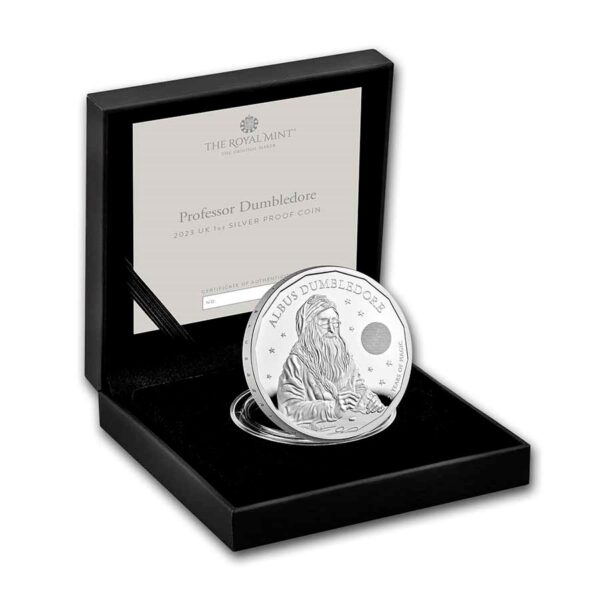 Packaging abierto mostrando la moneda de plata de Albus Dumbledore.